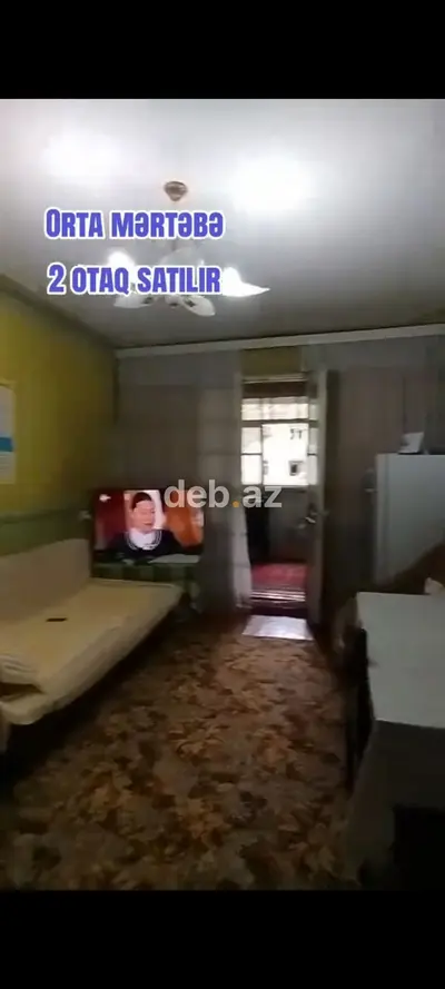 Orta mərtəbədə yerləşən 2 otaqlı mənzil satılır. Planlaşdırma: — kiçik şəkil 1
