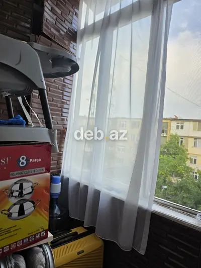 Qorodok naprotiv Evropa otel 
5/3 stalinka 
2 komanti 
sredniy remont — kiçik şəkil 12
