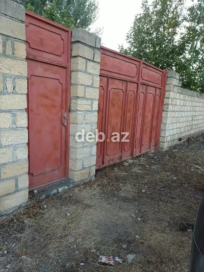 Ağdaşda, Qabil küçəsində 5 sot bar verən, daş hasarlı, kupçalı torpaq satılır — kiçik şəkil 1