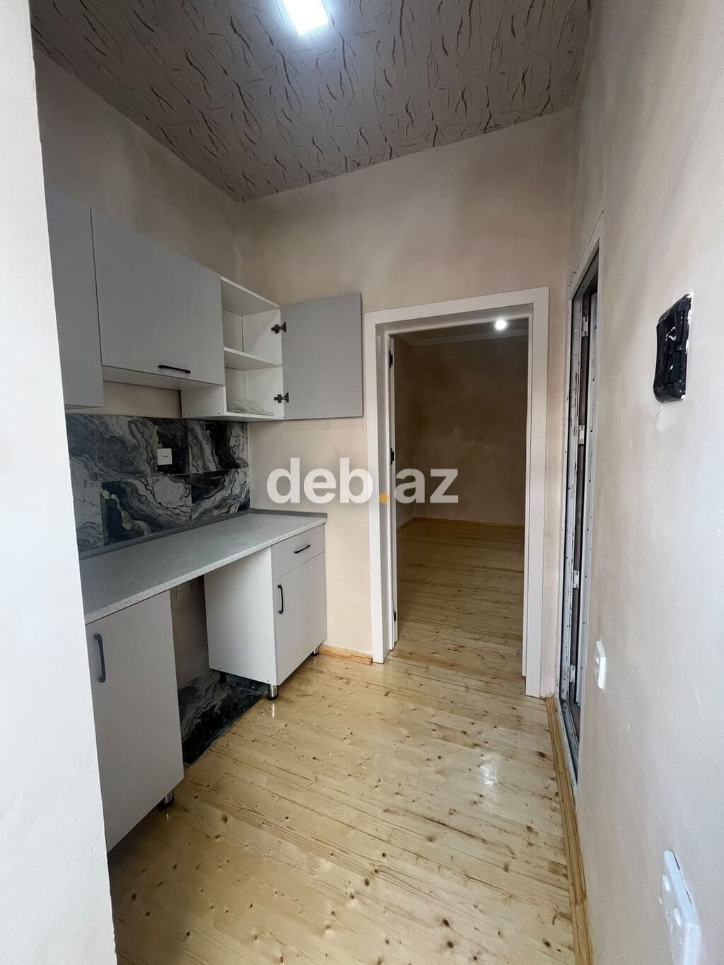 1 otaqlı, 38 kv. m, Yeni təmirli — şəkil 1