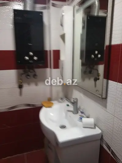 Azadlıq prospekti metrosu və 99 saylı məktəbin yanında mənzil satılır — kiçik şəkil 12