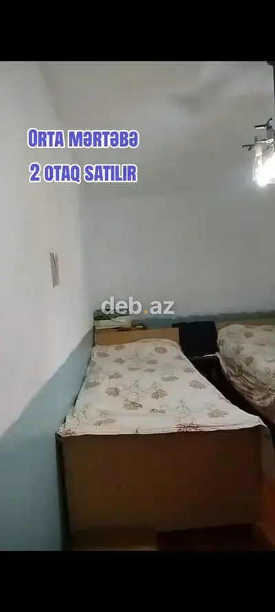Orta mərtəbədə yerləşən 2 otaqlı mənzil satılır. Planlaşdırma: — kiçik şəkil 5