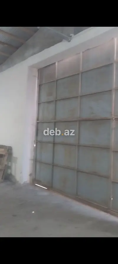 Anbar/Werkshop sahəsi - Geniş metal qapılı, yük maşınının girişinə — kiçik şəkil 2